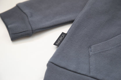 Kangaroo pocket and rib cuff detail on fjord french terry kids hoodie