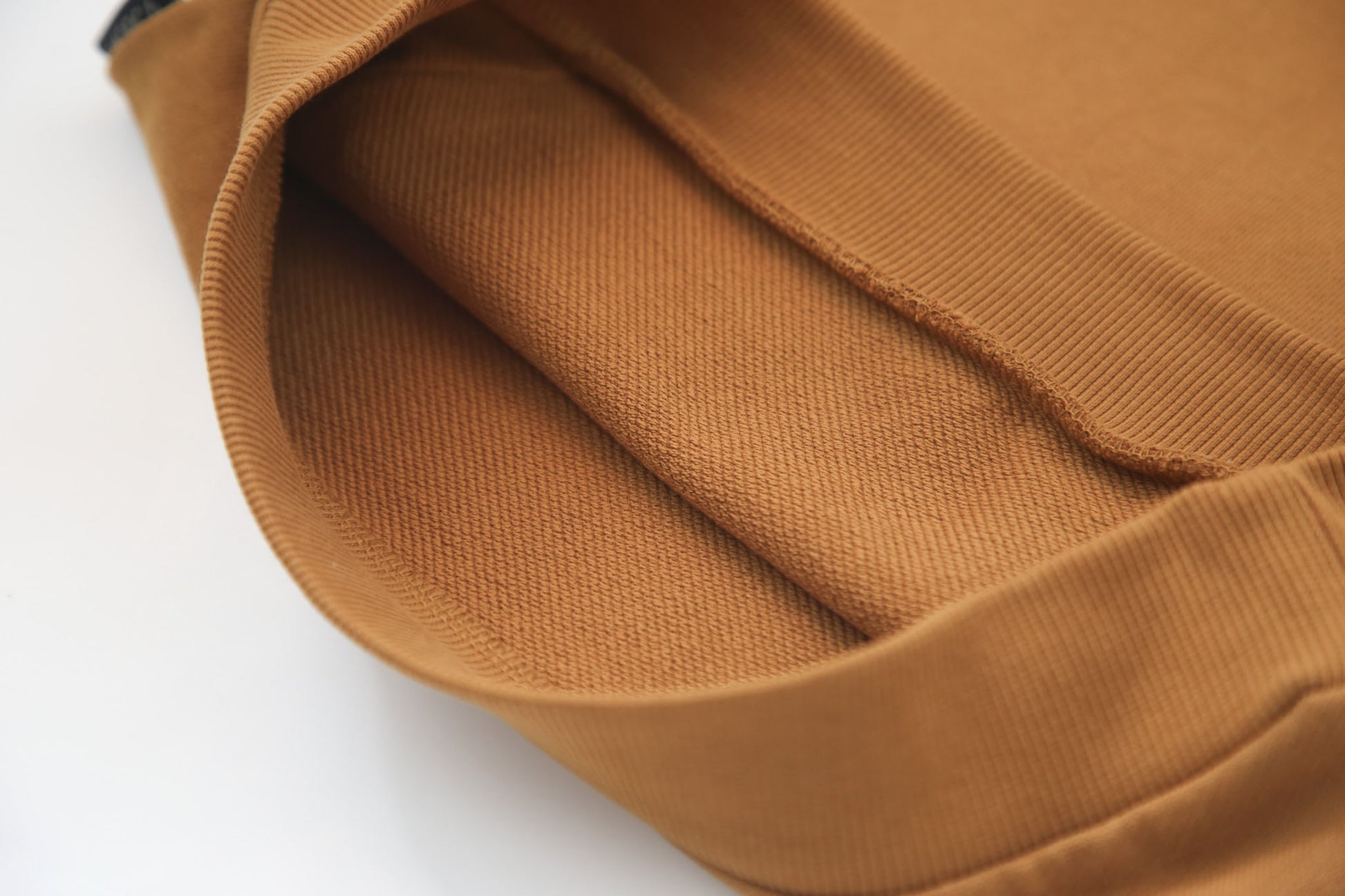 Close-up of french terry fabric and hood detail – ginger kids hoodie