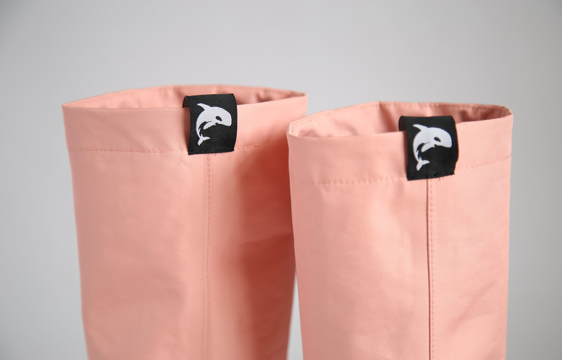 Easy pull-on handles detail on coral rain boots waders